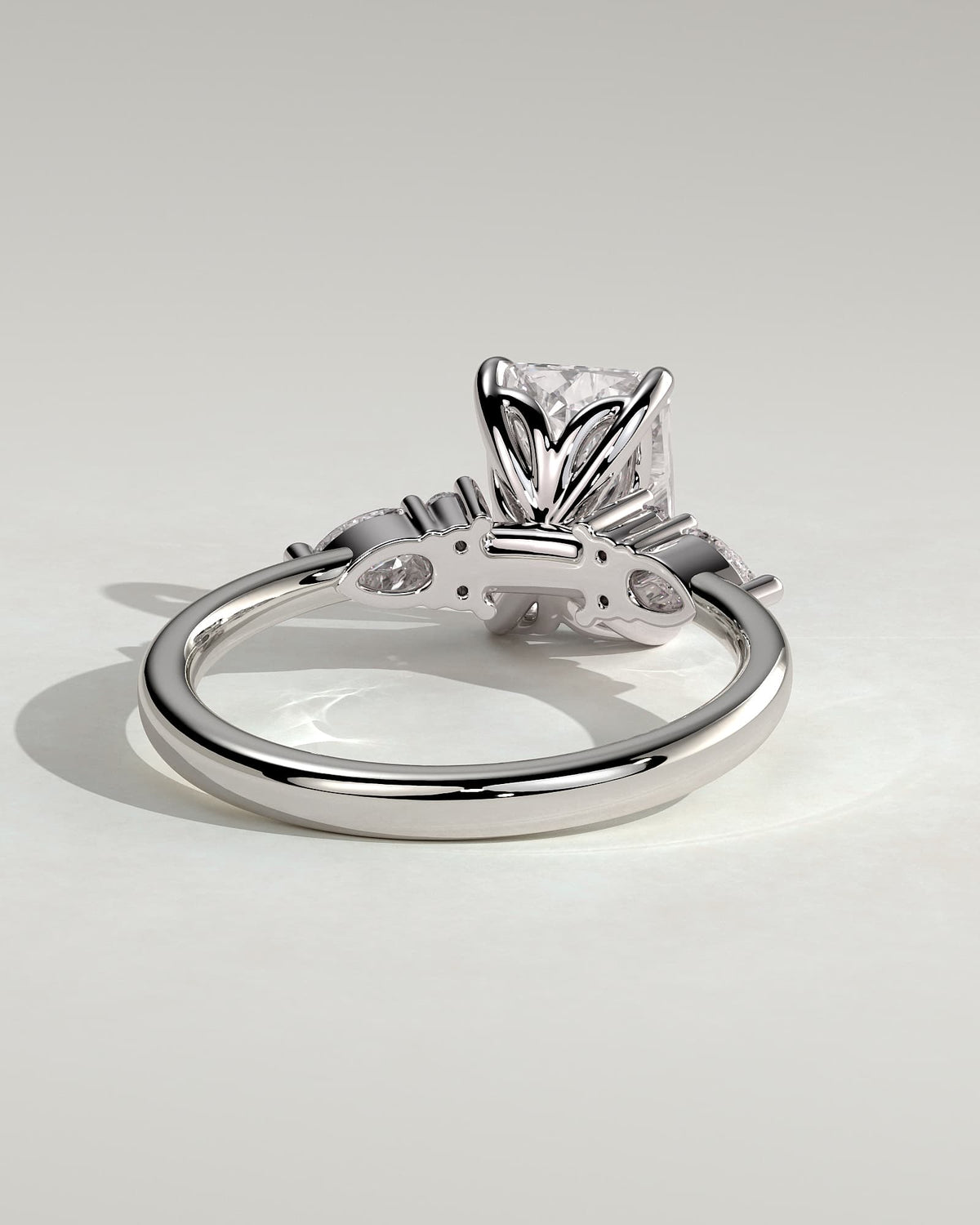 Heidi - Radiant Claw Solitaire with Pear Accents and Round Shoulder Stones Engagement Ring - White Gold