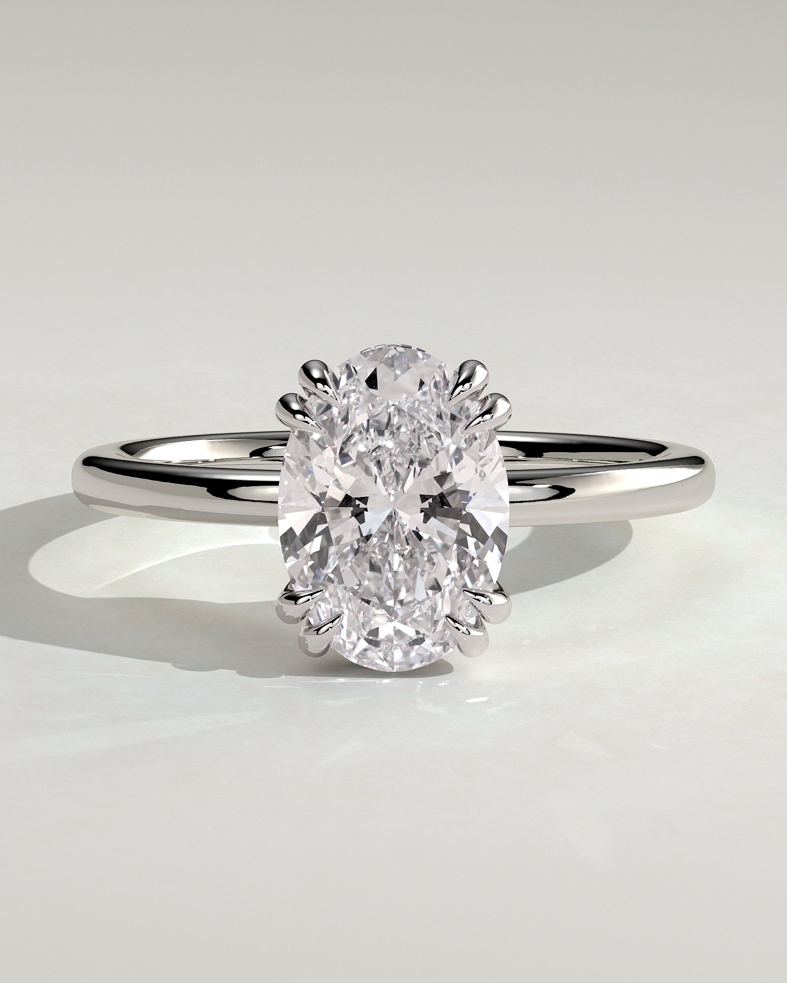 Avery - Oval Double Claw Solitaire with Hidden Halo Engagement Ring - Platinum - White Gold / Platinum 2ct