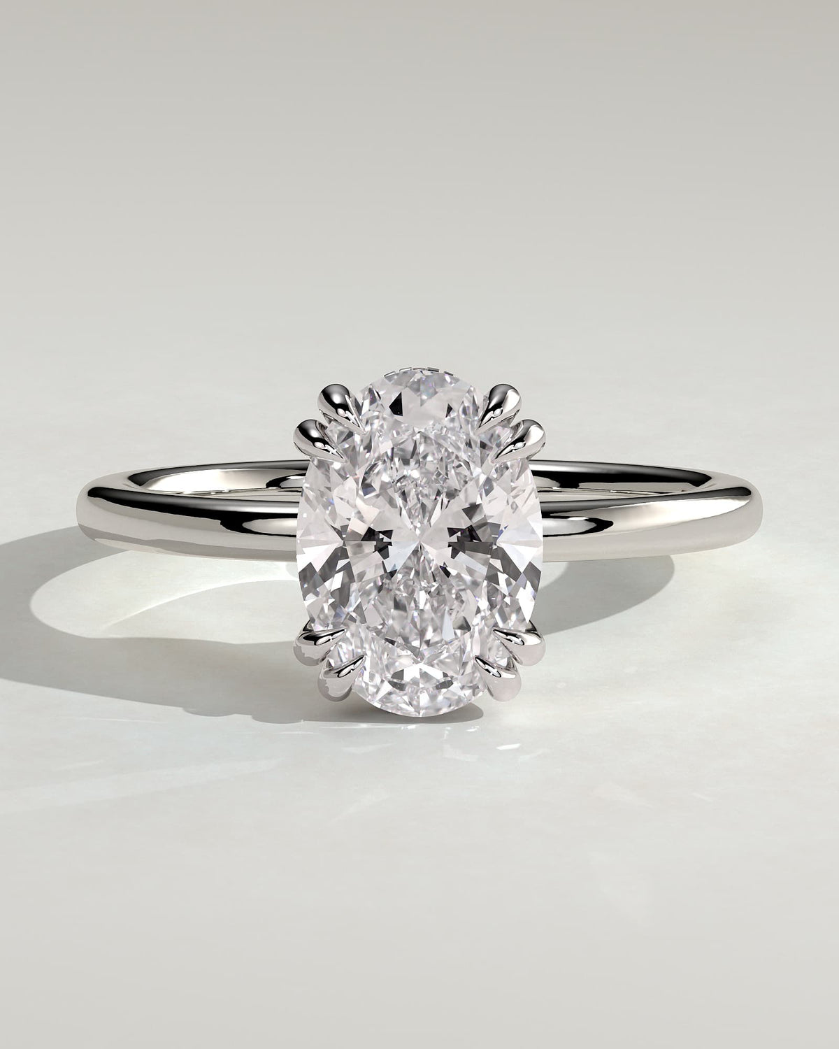 Avery - Oval Double Claw Solitaire with Hidden Halo Engagement Ring - White Gold