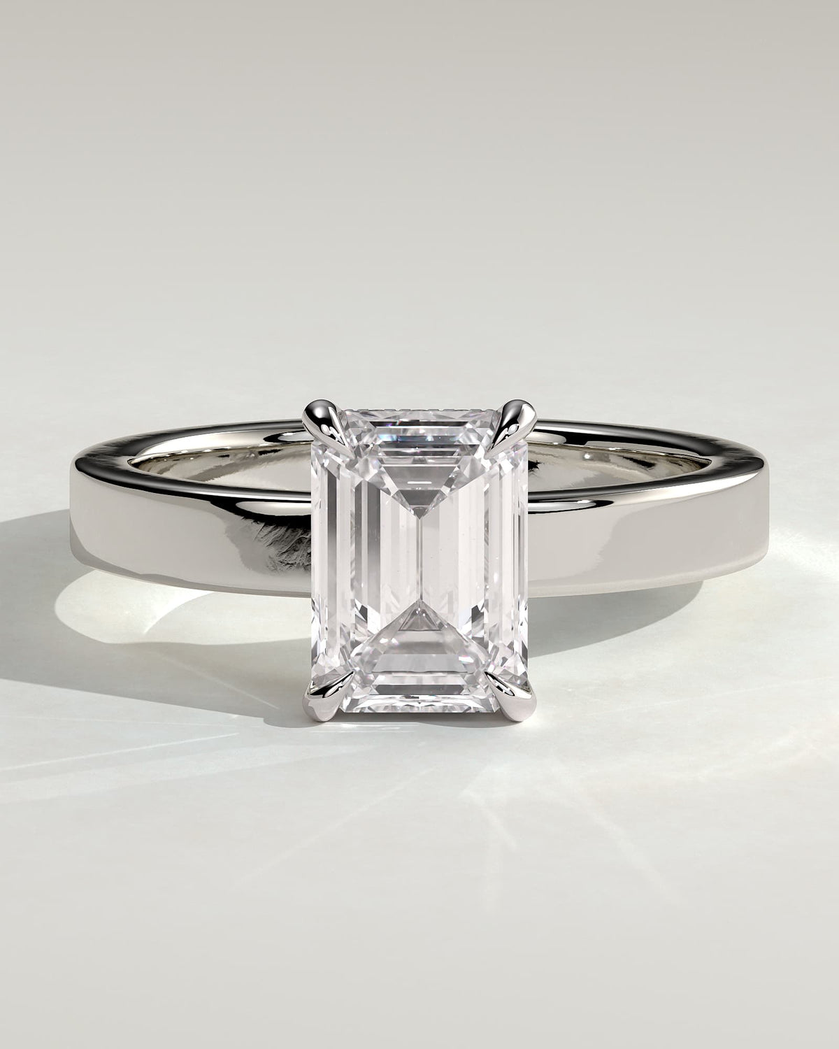 Carmella - Emerald Claw Solitaire with Flat Cigar Band and Hidden Halo Engagement Ring - White Gold