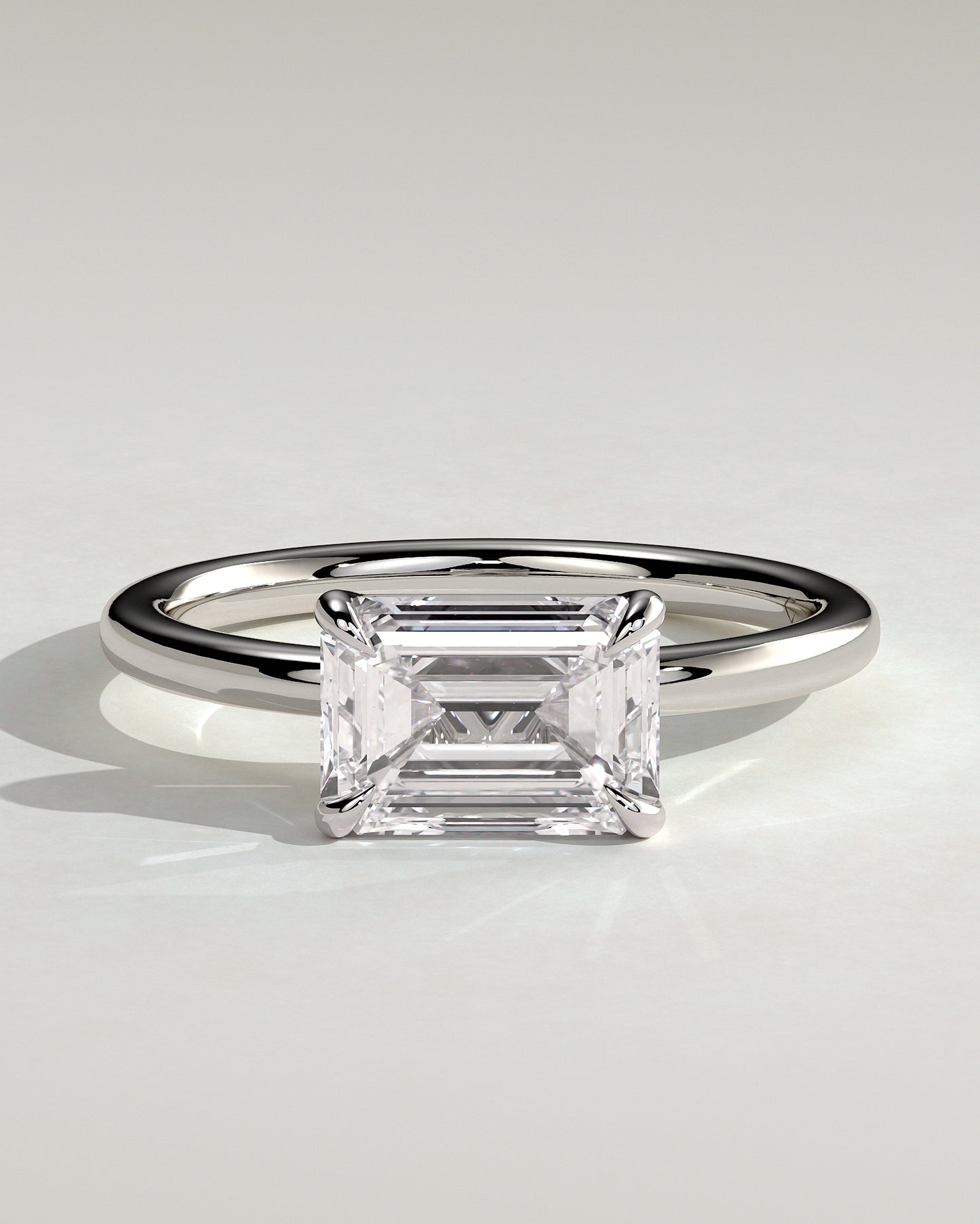 Debbie - Emerald East West Claw Solitaire Engagement Ring - Platinum - White Gold / Platinum 2ct