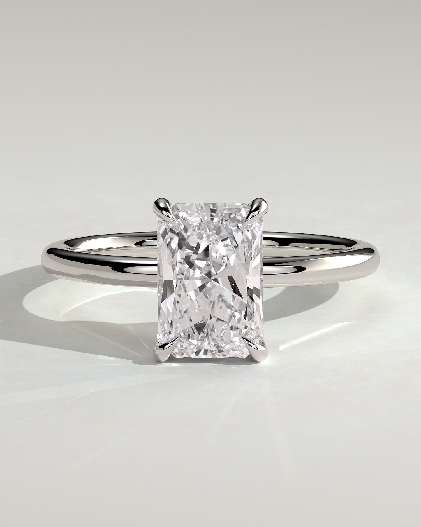Judy - Radiant Claw Solitaire Engagement Ring - Platinum