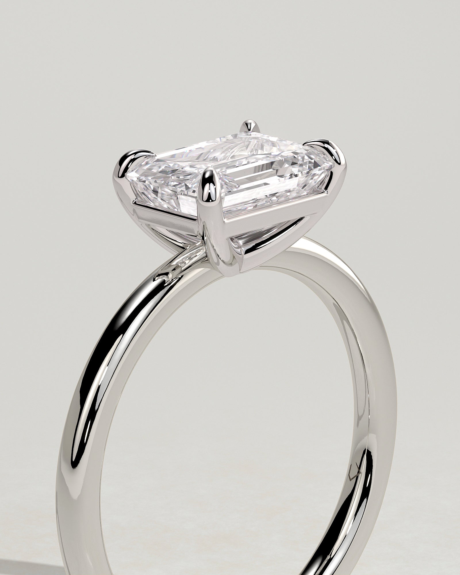 Debbie - Emerald East West Claw Solitaire Engagement Ring - Platinum - White Gold / Platinum 2ct