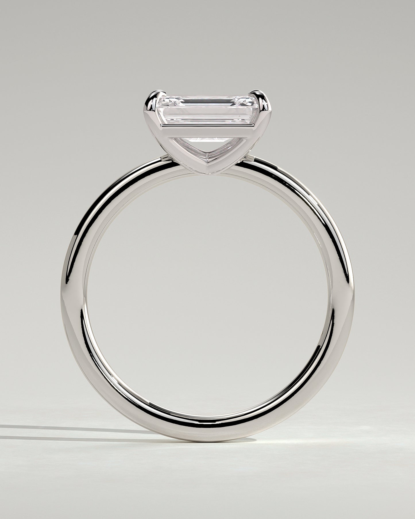 Debbie - Emerald East West Claw Solitaire Engagement Ring - Platinum - White Gold / Platinum 2ct