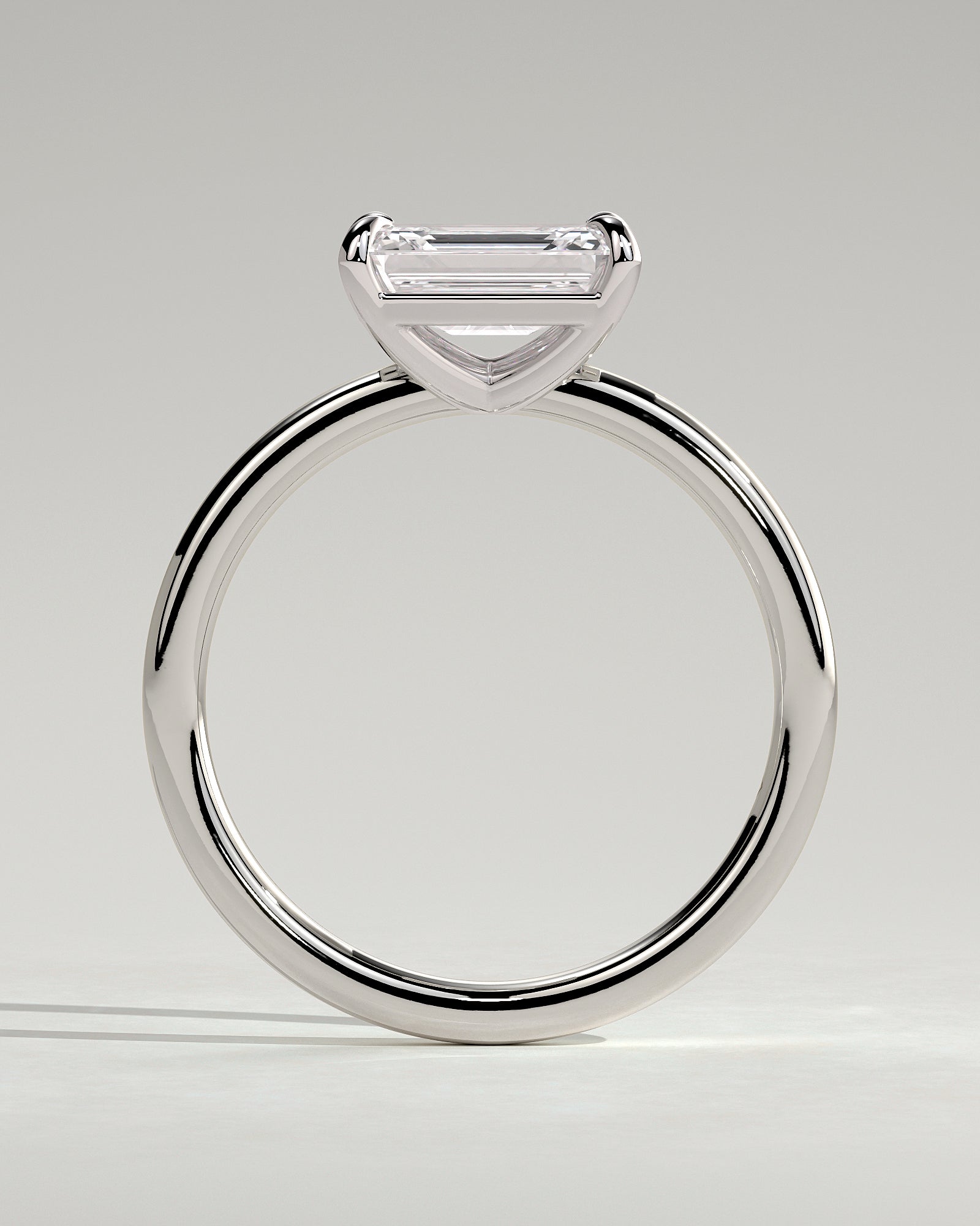 Debbie - Emerald East West Claw Solitaire Engagement Ring - Platinum - White Gold / Platinum 2ct