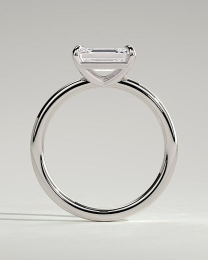 Debbie - Emerald East West Claw Solitaire Engagement Ring - Platinum