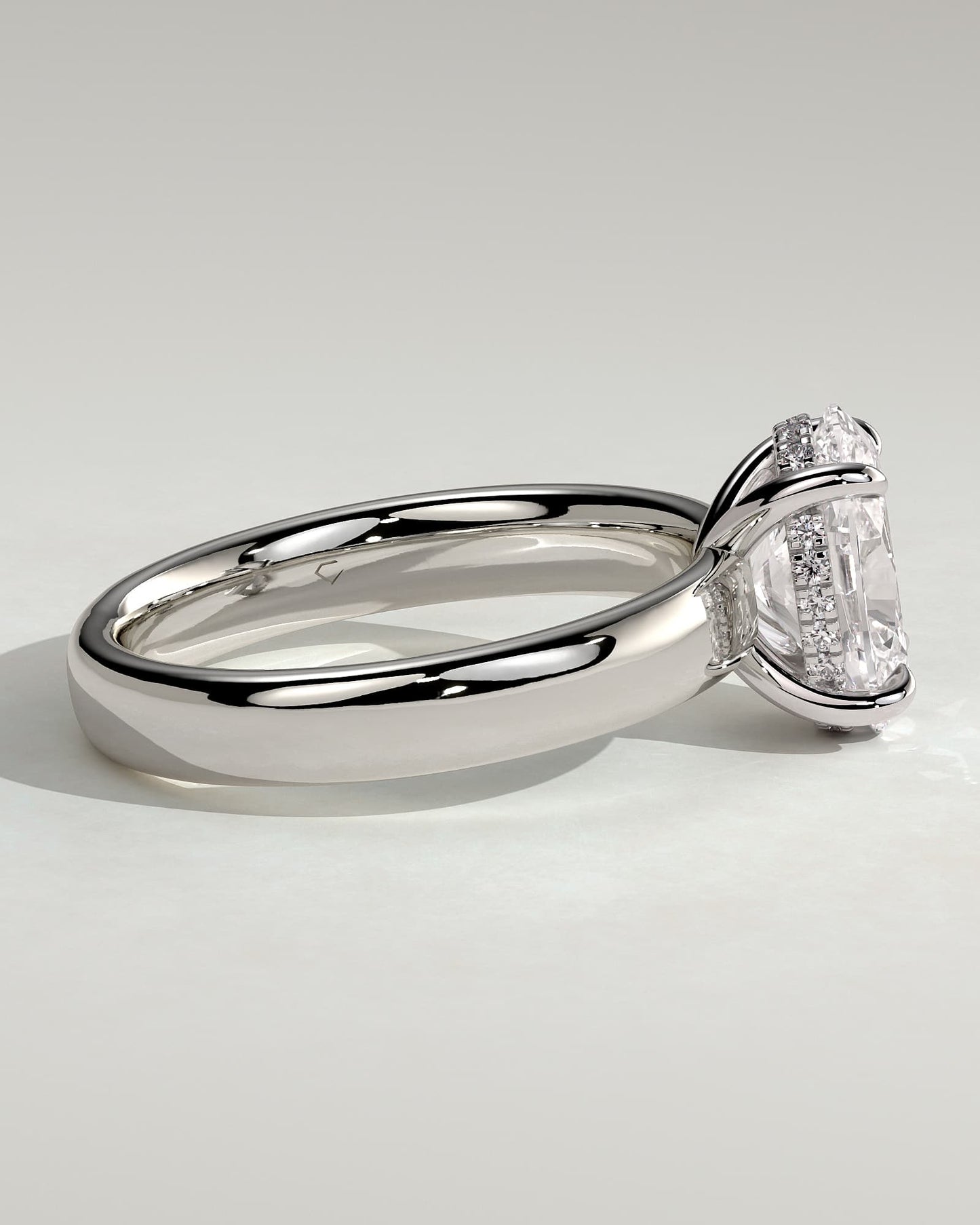 Bronte - Oval Claw Solitaire with Cigar Band and Hidden Halo Engagement Ring - Platinum