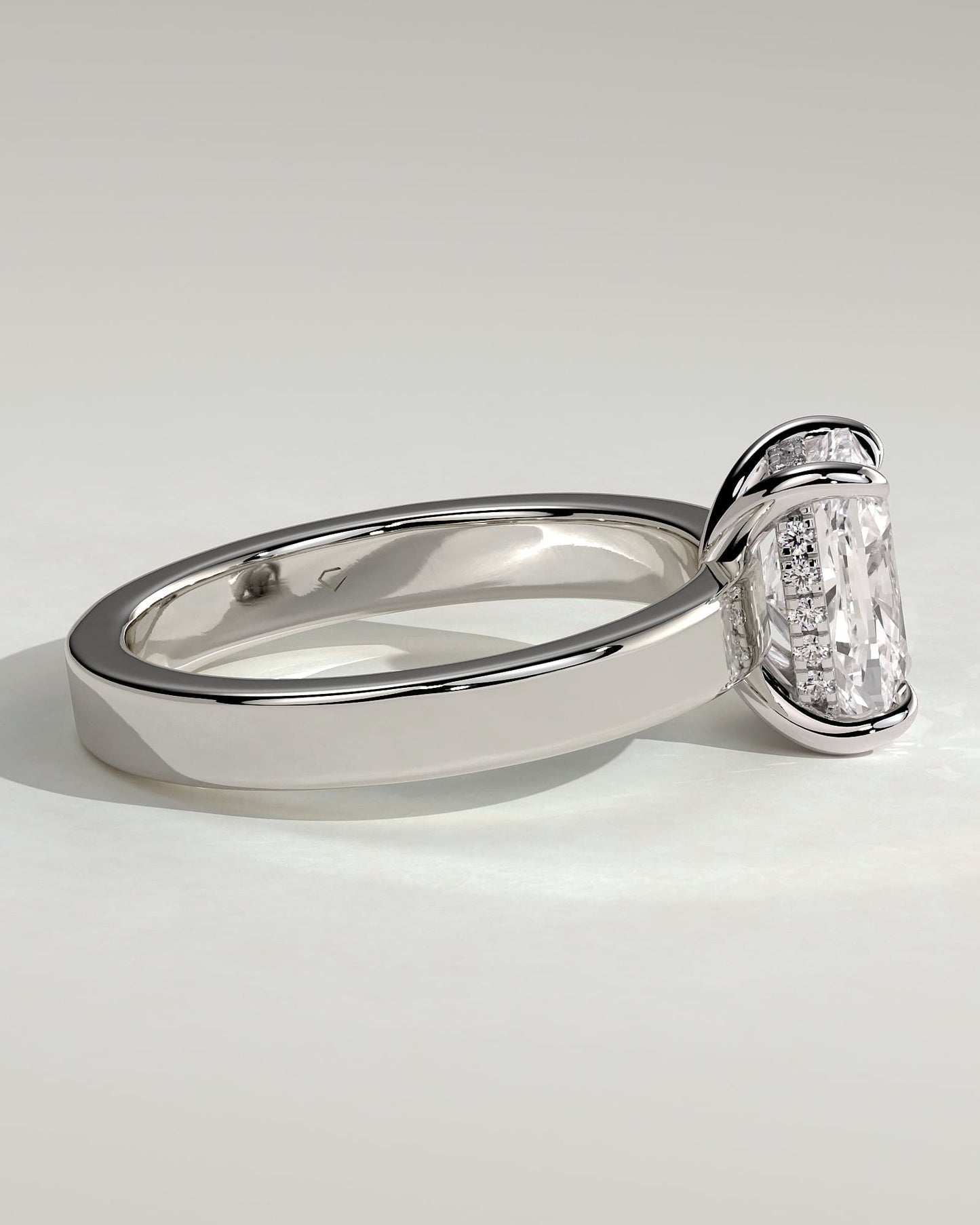 Kai - Elongated Cushion Claw Solitaire with Flat Cigar Band and Hidden Halo Engagement Ring - Platinum