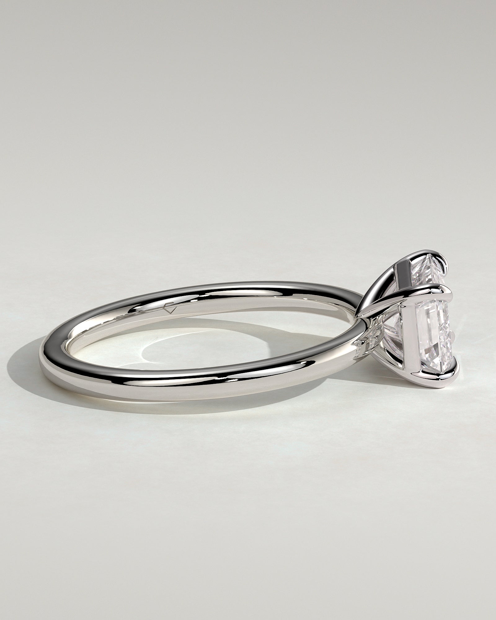 Debbie - Emerald East West Claw Solitaire Engagement Ring - Platinum - White Gold / Platinum 2ct