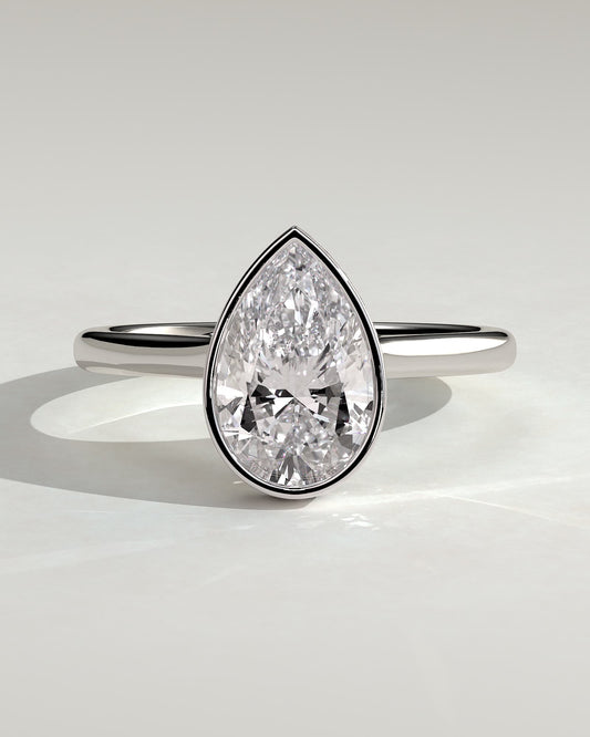 Jude - Pear Bezel Solitaire with Hidden Halo and Cathedral High Setting Engagement Ring - White Gold