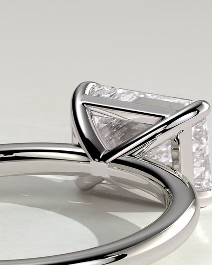 Debbie - Emerald East West Claw Solitaire Engagement Ring - Platinum