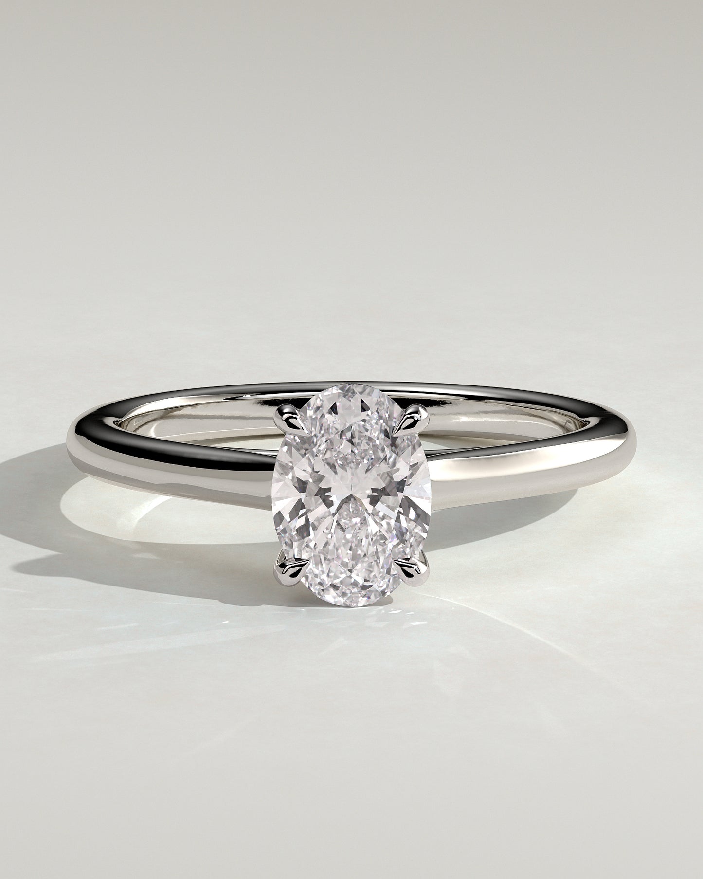 Hilary - Oval Claw Solitaire with Cathedral High Setting Engagement Ring - Platinum
