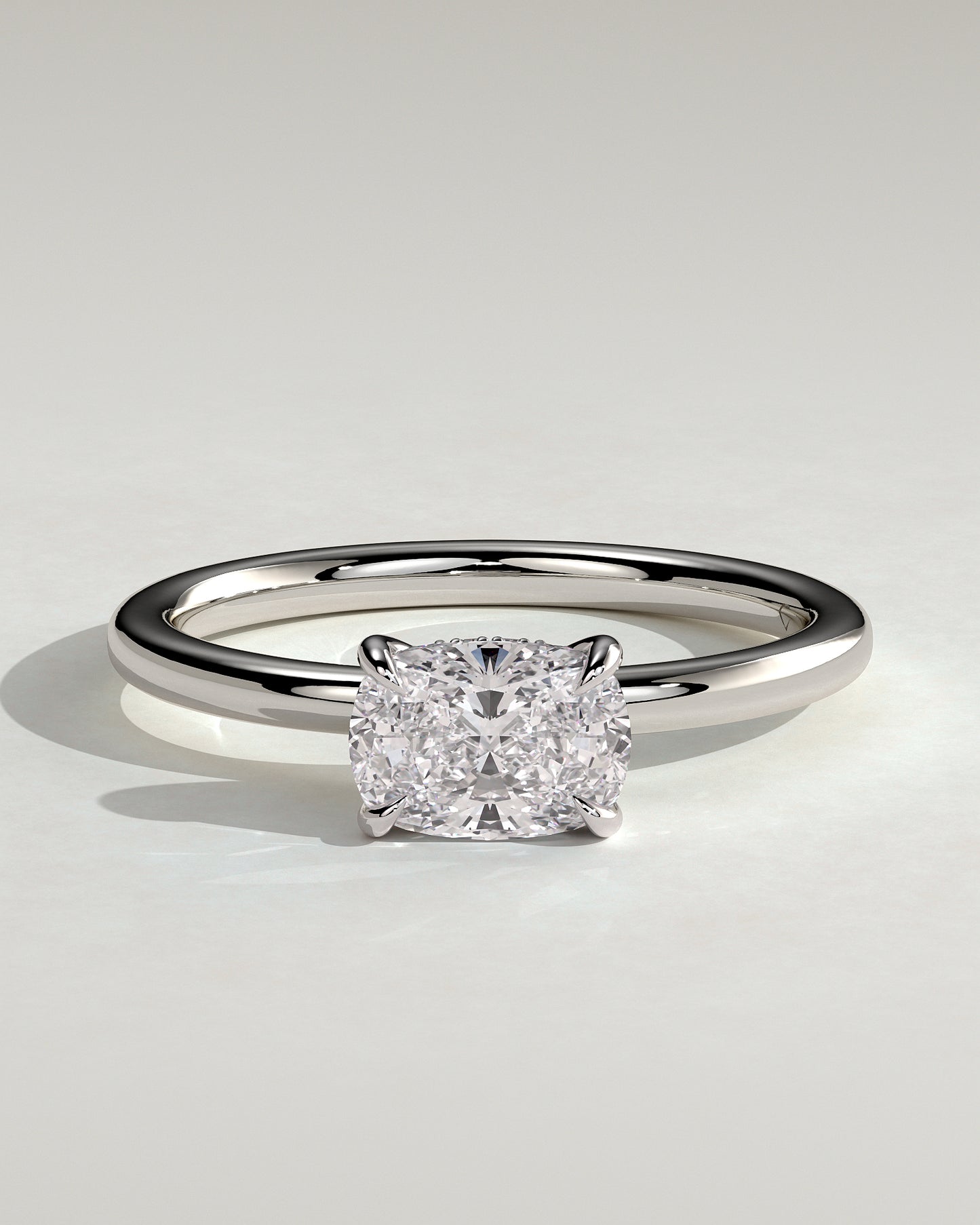 Frida - Elongated Cushion East West Claw Solitaire with Hidden Halo Engagement Ring - Platinum