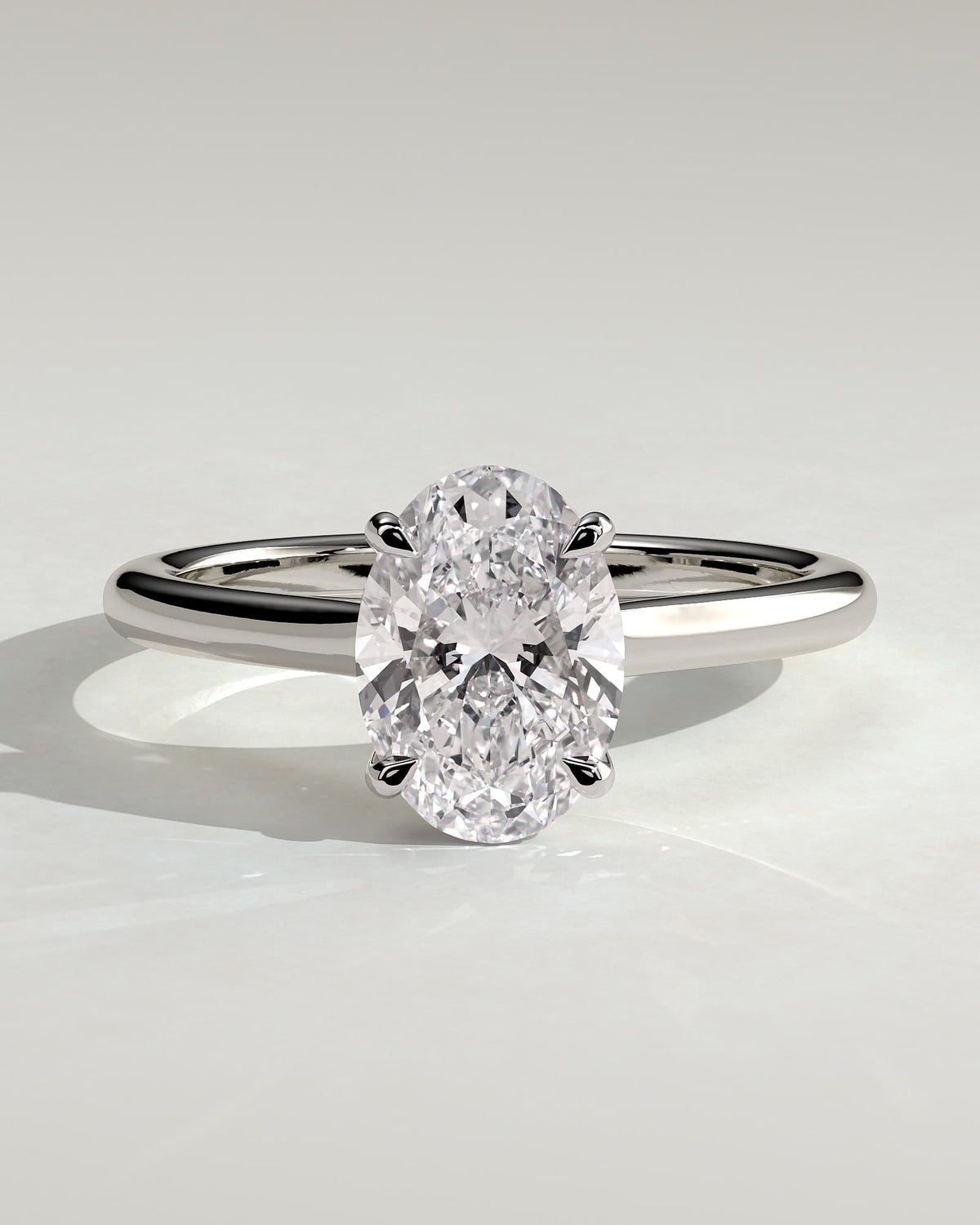 Hilary - Oval Claw Solitaire with Cathedral High Setting Engagement Ring - White Gold