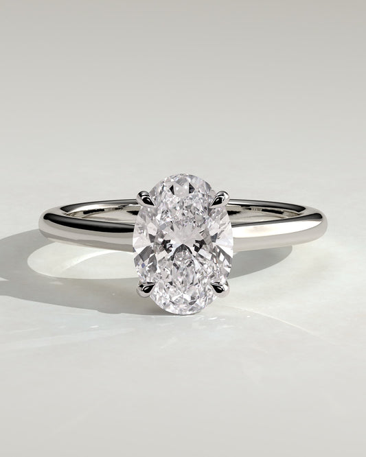 Hilary - Oval Claw Solitaire with Cathedral High Setting Engagement Ring - White Gold