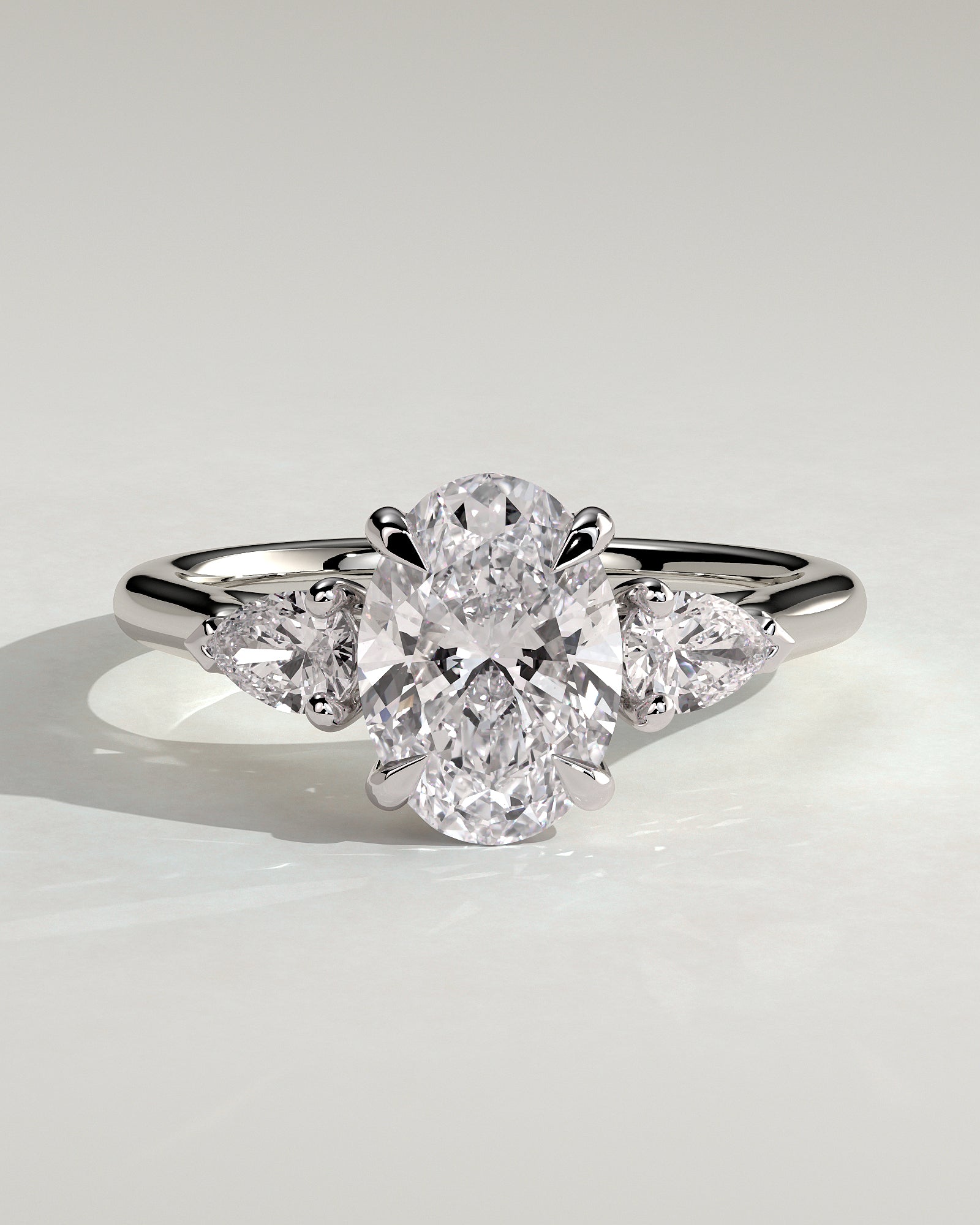 Alexia - Oval Claw Trilogy with Pear Side Stones and Cathedral Setting Engagement Ring - Platinum - White Gold / Platinum 2ct