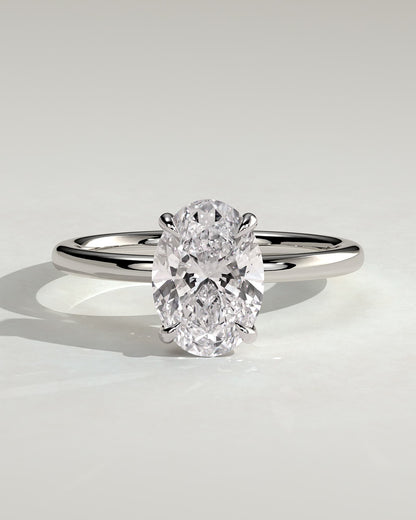 Daisy - Classic Oval Claw Solitaire Engagement Ring - Platinum