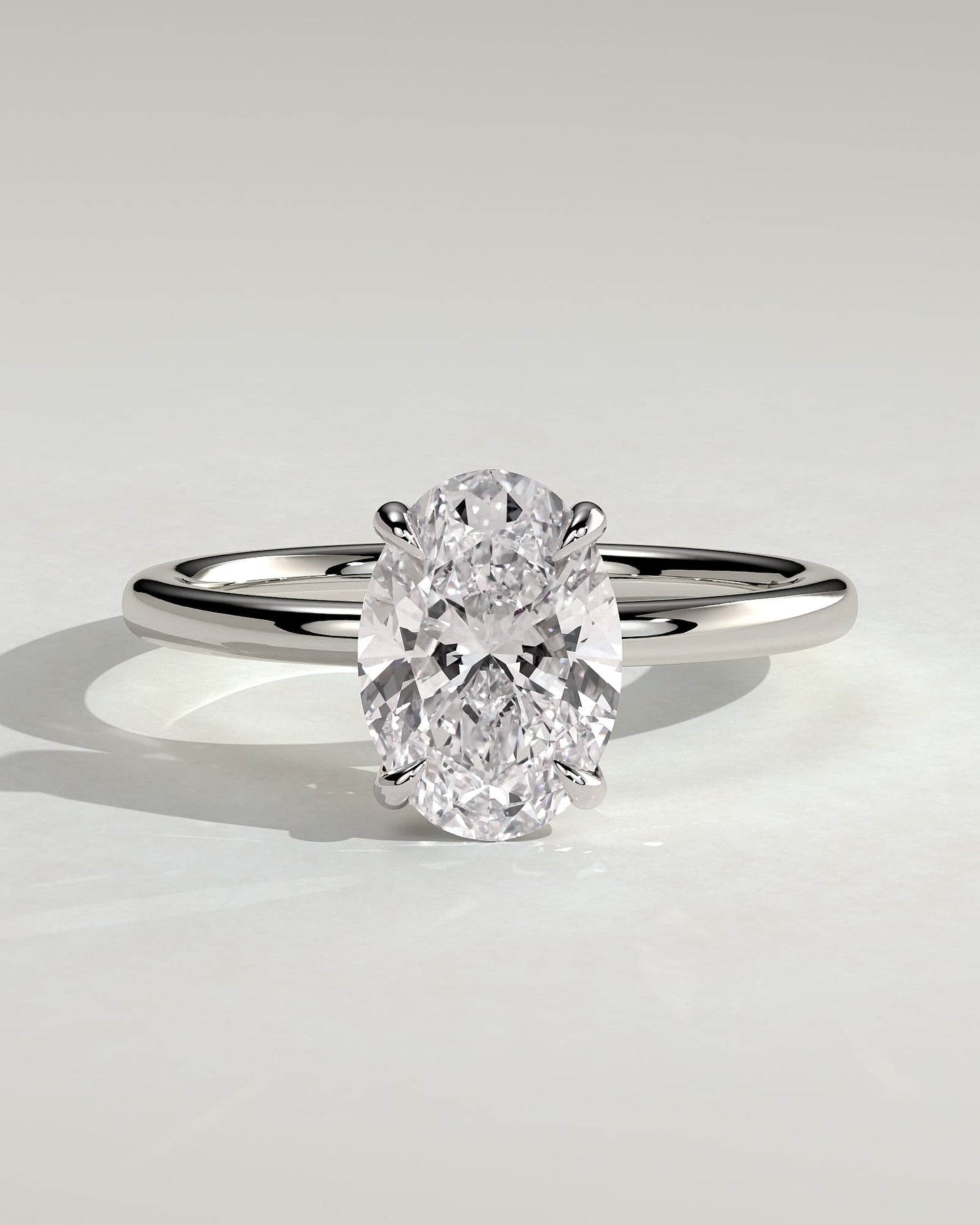 Daisy - Classic Oval Claw Solitaire Engagement Ring - White Gold