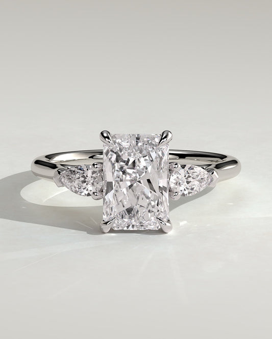 Jasmine - Radiant Claw Trilogy with Pear Side Stones and Cathedral Setting Engagement Ring - White Gold