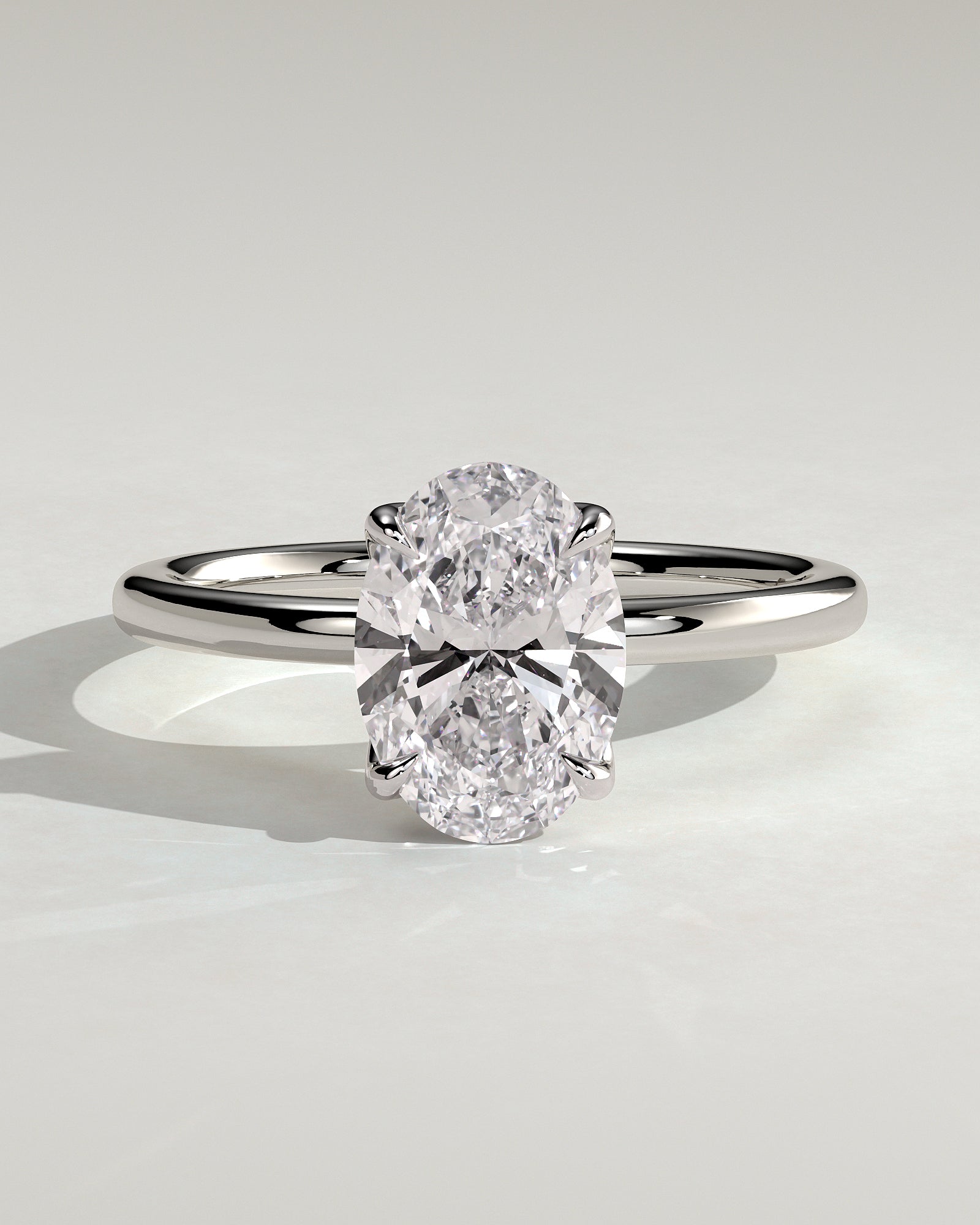 Aurelie - Oval Claw Solitaire with Petal Gallery and Accent Leaf Detail Engagement Ring - Platinum - White Gold / Platinum 2ct
