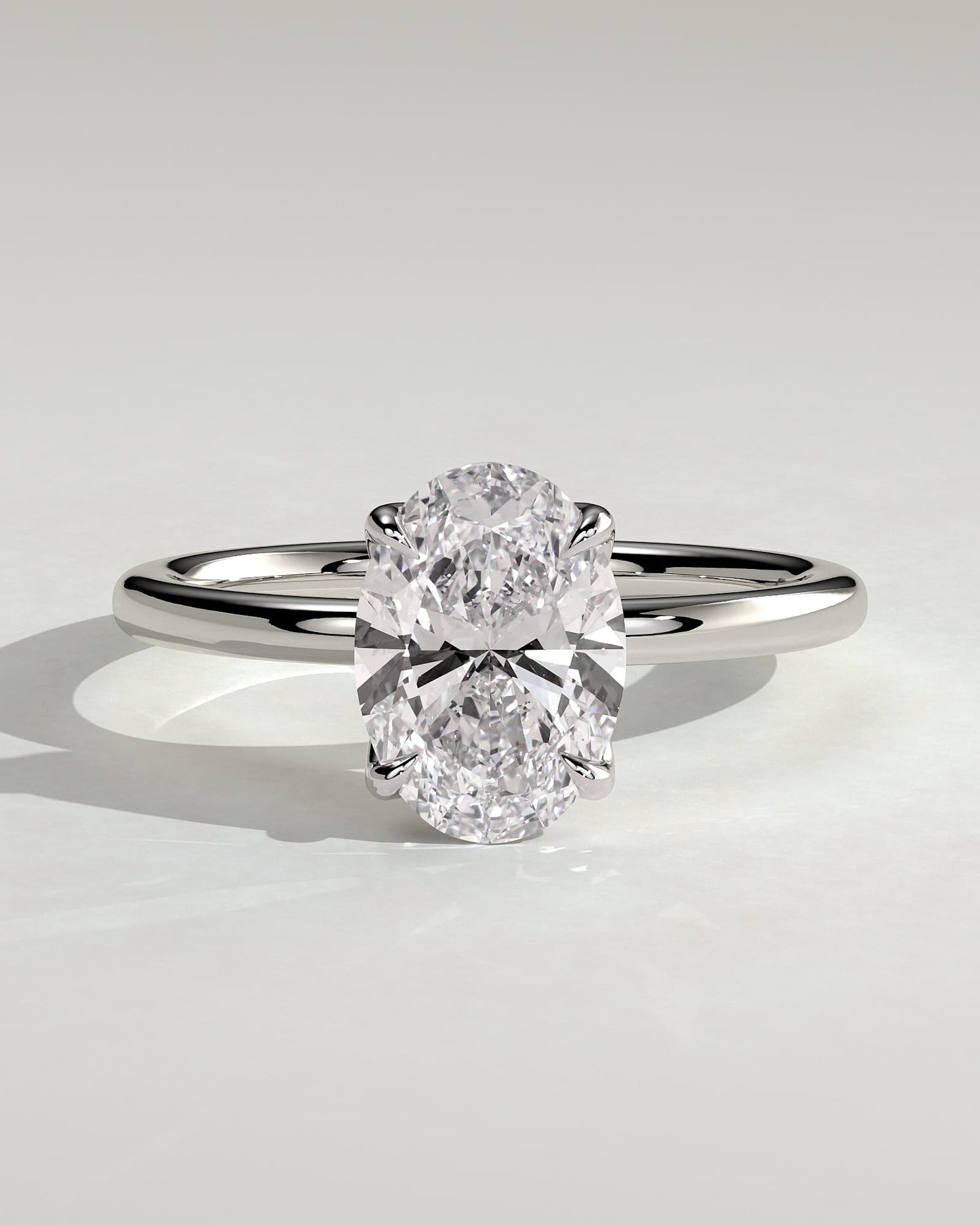 Aurelie - Oval Claw Solitaire with Petal Gallery and Accent Leaf Detail Engagement Ring - White Gold