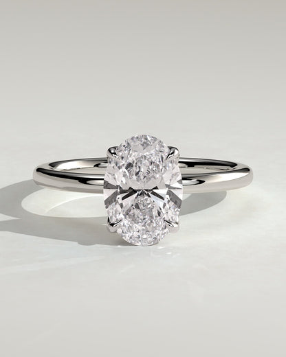 Aurelie - Oval Claw Solitaire with Petal Gallery and Accent Leaf Detail Engagement Ring - White Gold