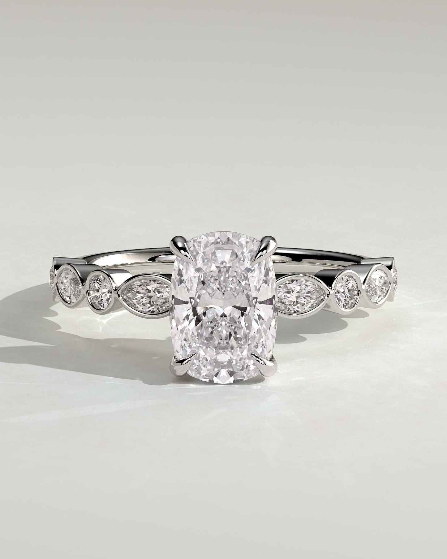 Carrie - Elongated Cushion Claw Solitaire with Round-Marquise Bezel Accent Stones Engagement Ring - White Gold