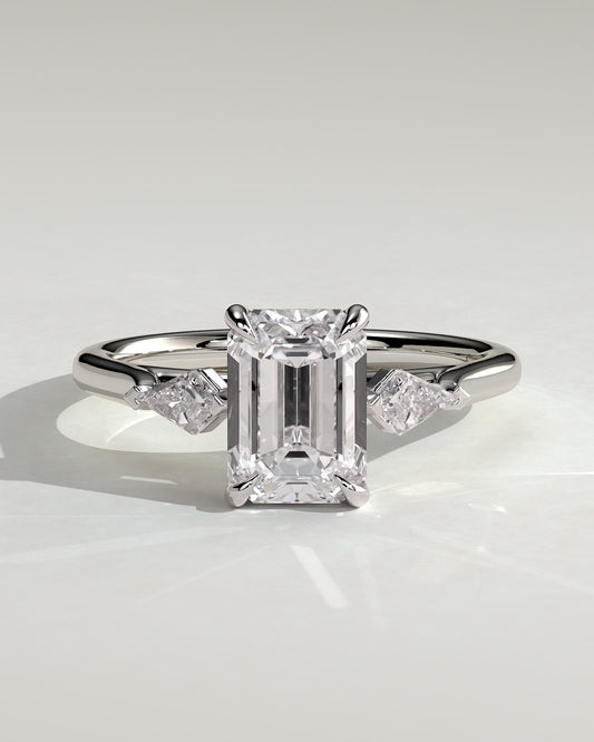 Elphie - Emerald Claw Trilogy with Kite Side Stones Engagement Ring - Platinum