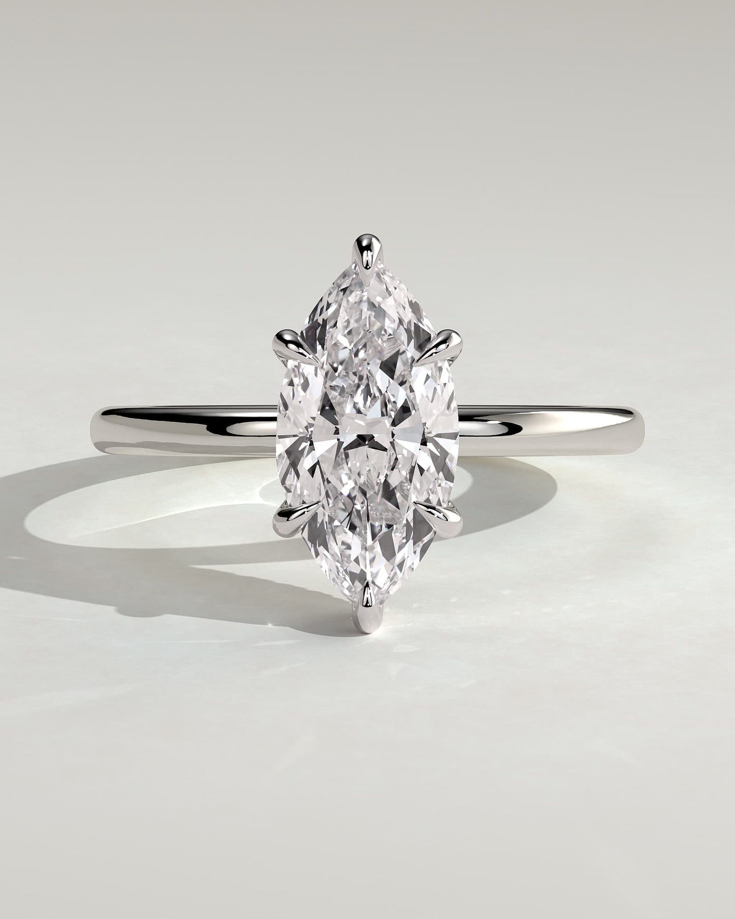 Claire - Marquise Claw Solitaire with Wrap Around Hidden Halo Engagement Ring - White Gold