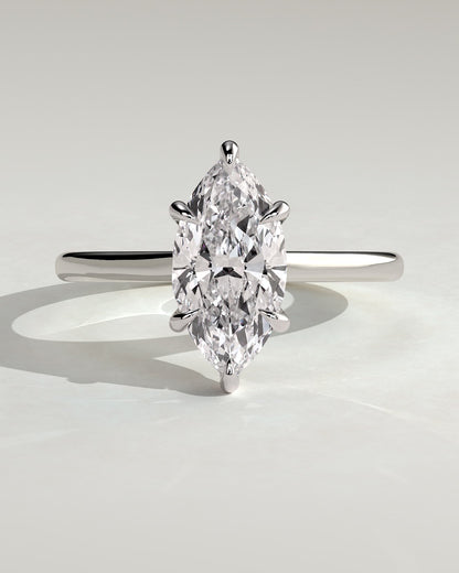 Jenna - Marquise Claw Solitaire with Hidden Halo and Cathedral High Setting Engagement Ring - White Gold