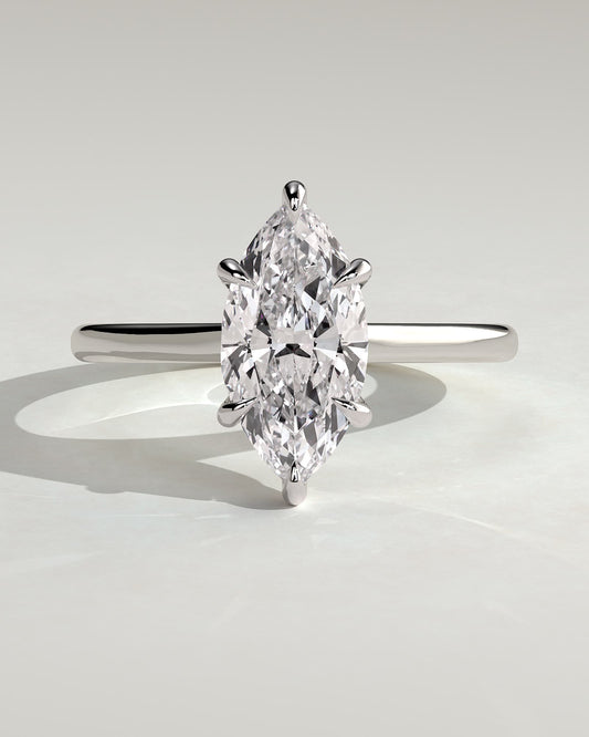 Jenna - Marquise Claw Solitaire with Hidden Halo and Cathedral High Setting Engagement Ring - White Gold
