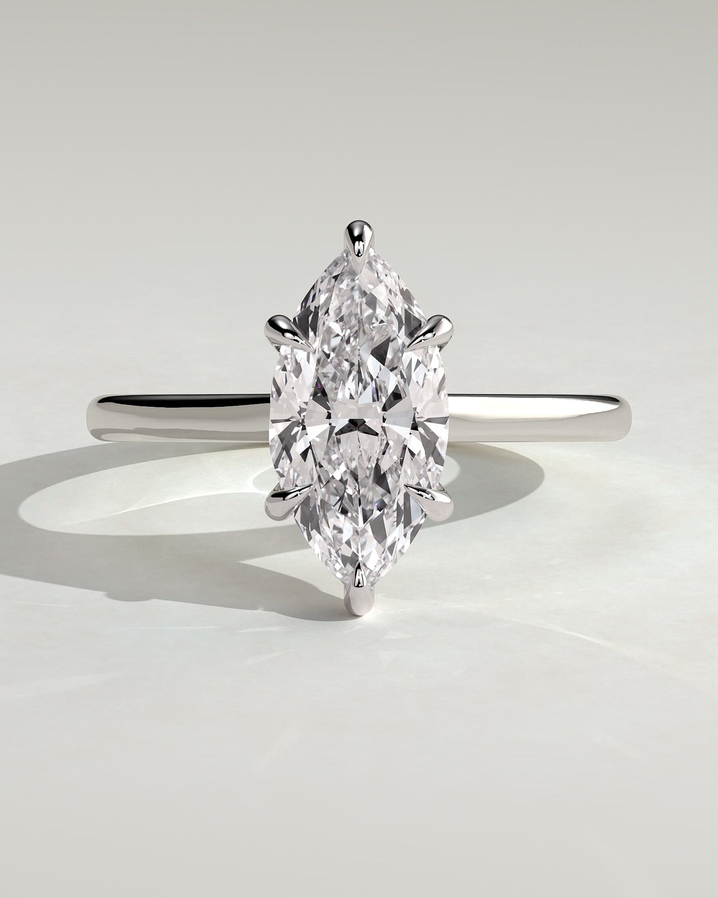 Jenna - Marquise Claw Solitaire with Hidden Halo and Cathedral High Setting Engagement Ring - Platinum