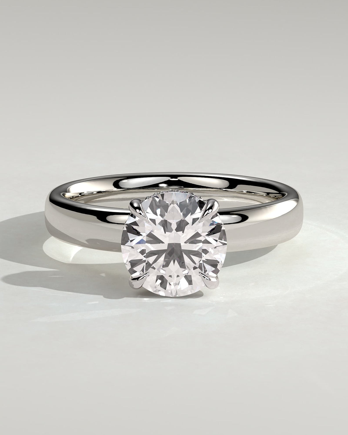 Kylie - Statement Round Claw Solitaire with Cigar Band and Hidden Halo Engagement Ring - Platinum