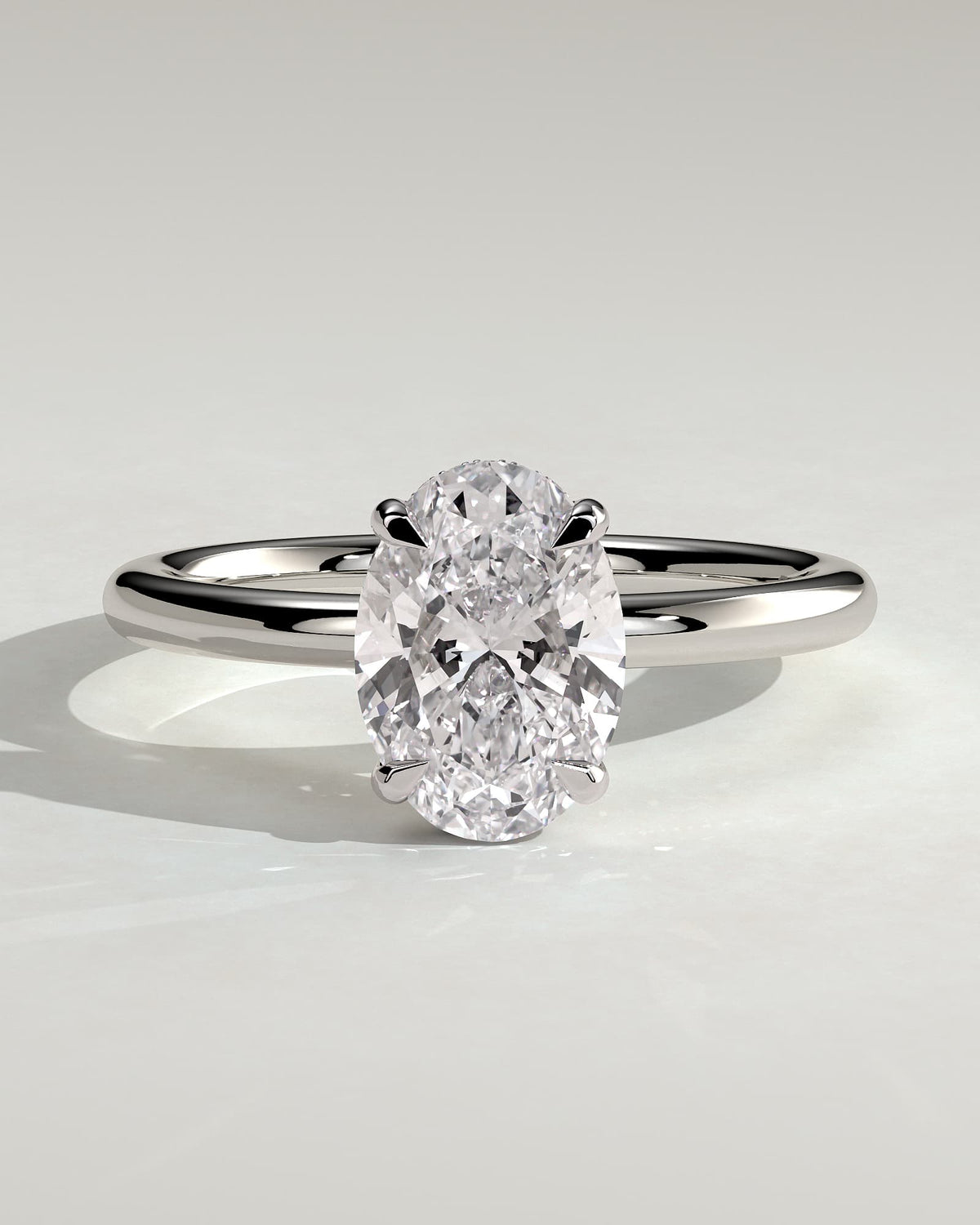 Emma - Classic Oval Claw Solitaire with Hidden Halo Engagement Ring - White Gold