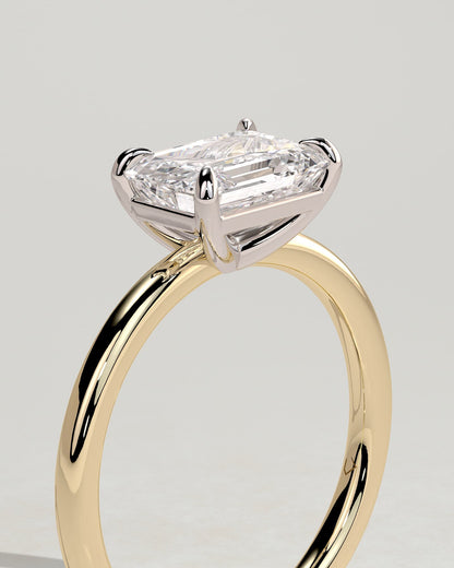 Debbie - Emerald East West Claw Solitaire Engagement Ring - Yellow Two-Tone