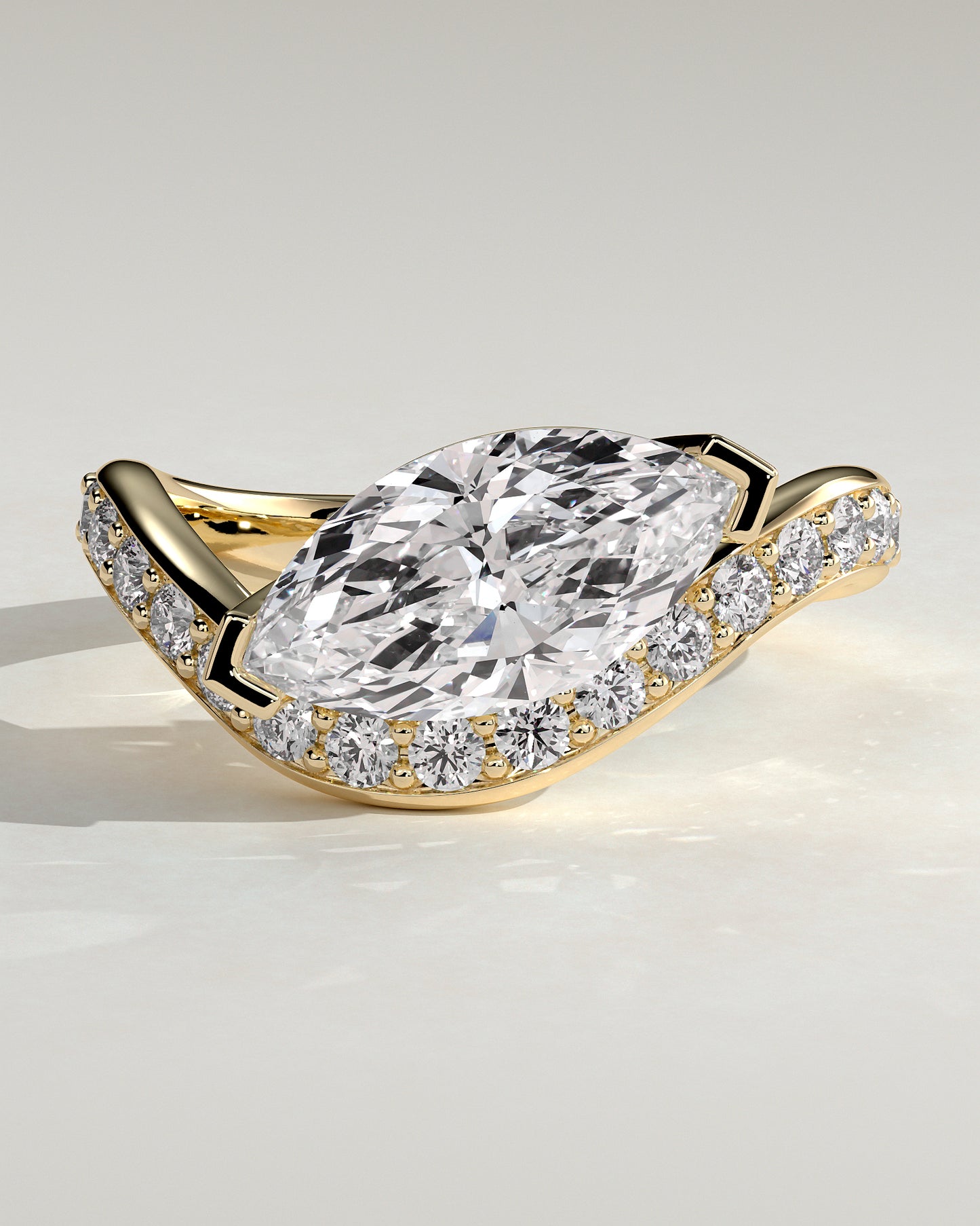 Lynn - Marquise Claw Solitaire with Bead Set Pave Wave Band and East West Setting Engagement Ring - Yellow Gold