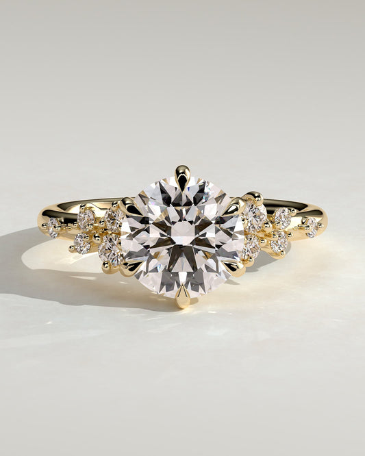 Molly - Round Claw Solitaire with Clustered Round Shoulder Stones Engagement Ring - Yellow Gold