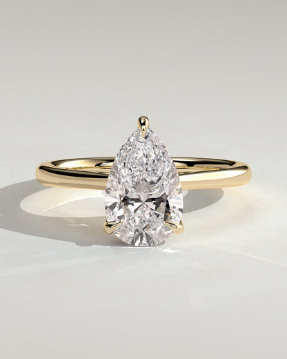 Courtney - Pear Claw Solitaire with Hidden Halo, Tapered Band and Cathedral High Setting Engagement Ring - Yellow Gold