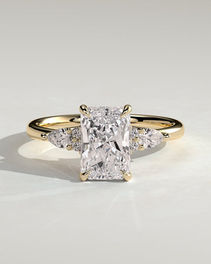 Heidi - Radiant Claw Solitaire with Pear Accents and Round Shoulder Stones Engagement Ring - Yellow Gold