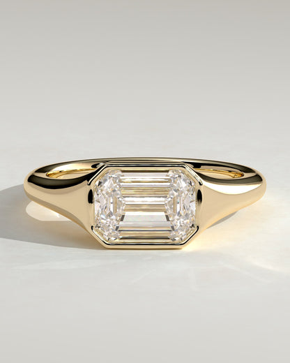 Montanah - Emerald East West Bezel Solitaire with Signet Band Engagement Ring - Yellow Gold