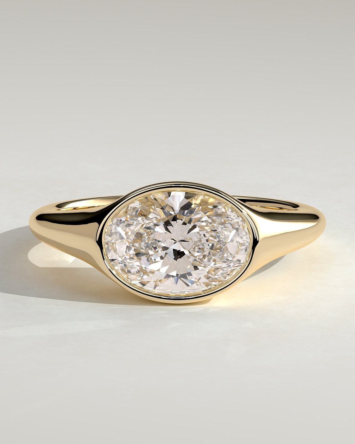 Sophie - Oval East West Bezel Solitaire with Signet Band Engagement Ring - Yellow Gold