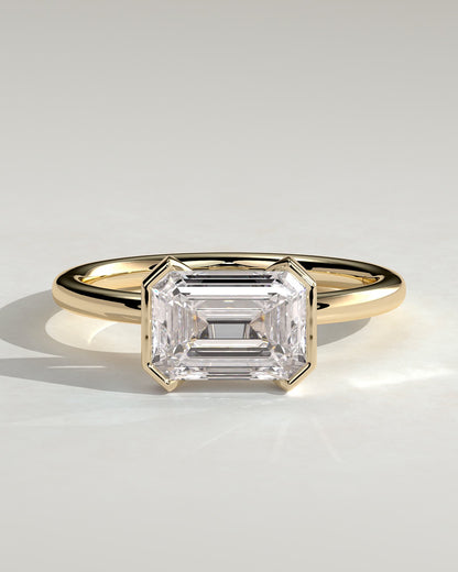Jodie - Emerald East West Half Bezel Solitaire Engagement Ring - Yellow Gold