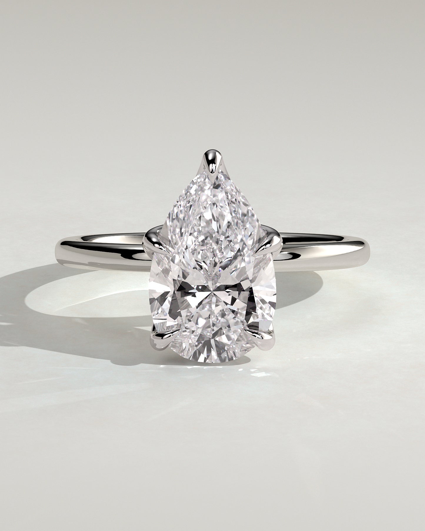 Blossom - Pear Claw Solitaire with Petal Gallery and Accented Tiara Detail Engagement Ring - Platinum