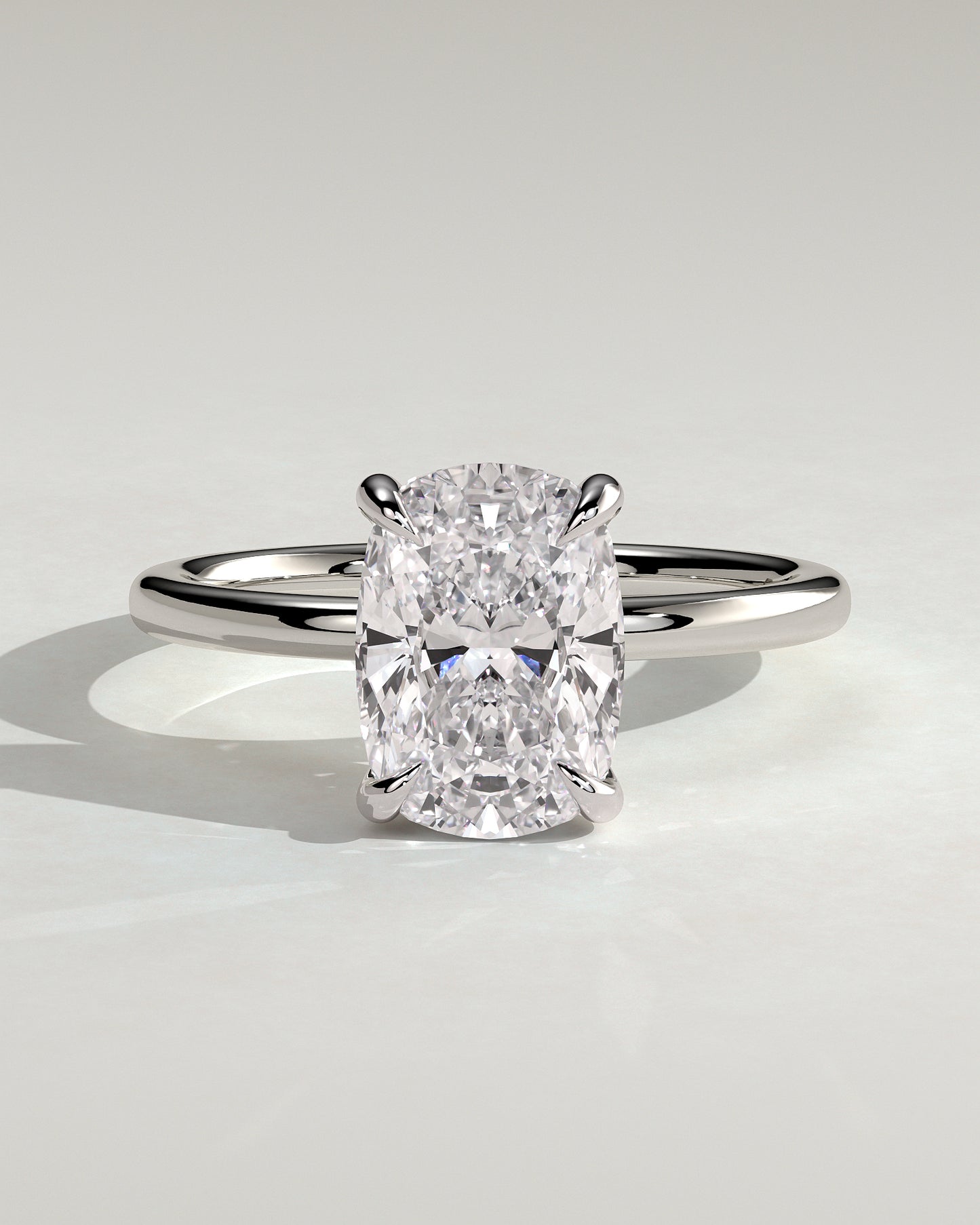 Ava - Elongated Cushion Claw Solitaire with Hidden Halo Engagement Ring - Platinum