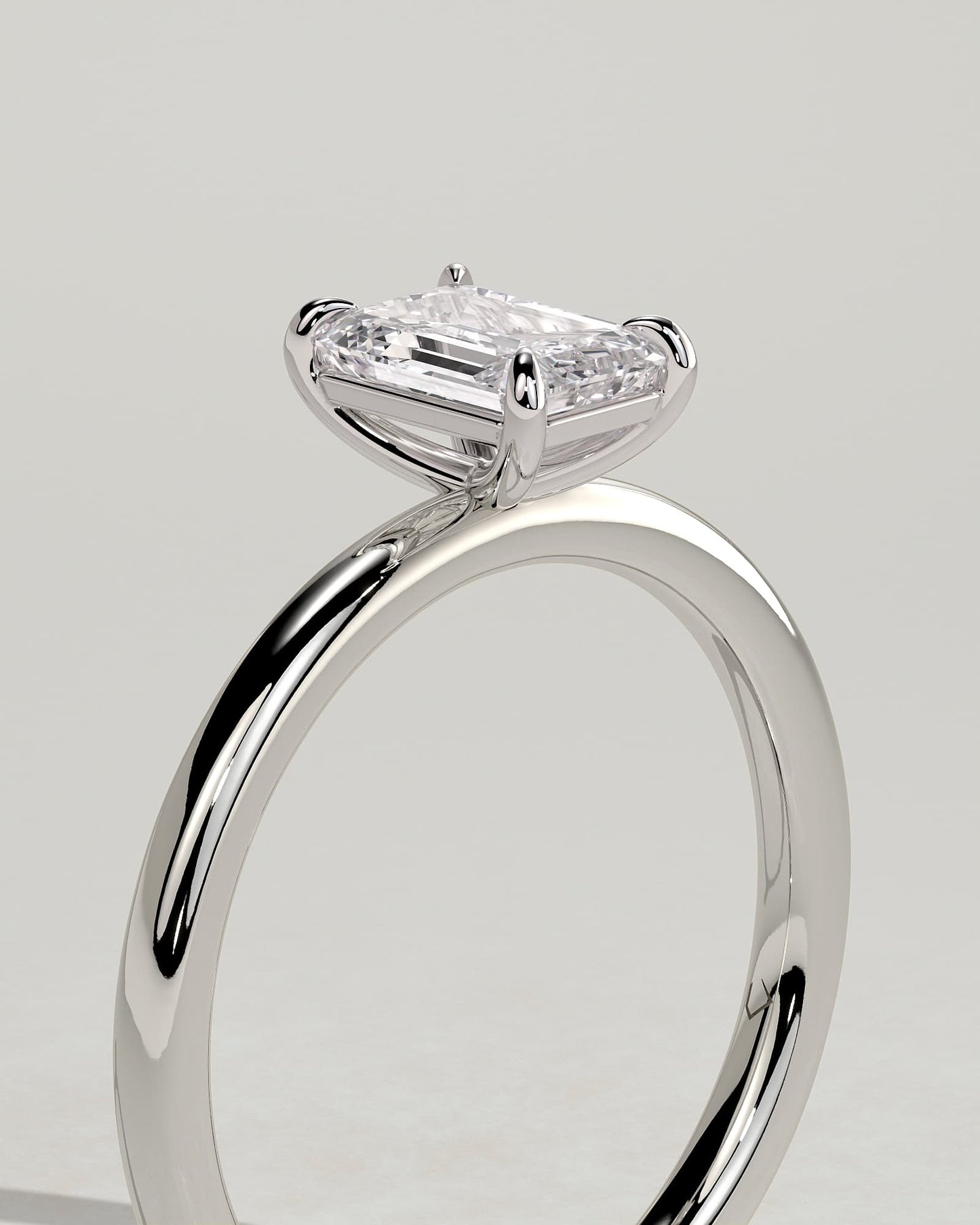 Alina - Emerald Claw Solitaire Engagement Ring - Platinum