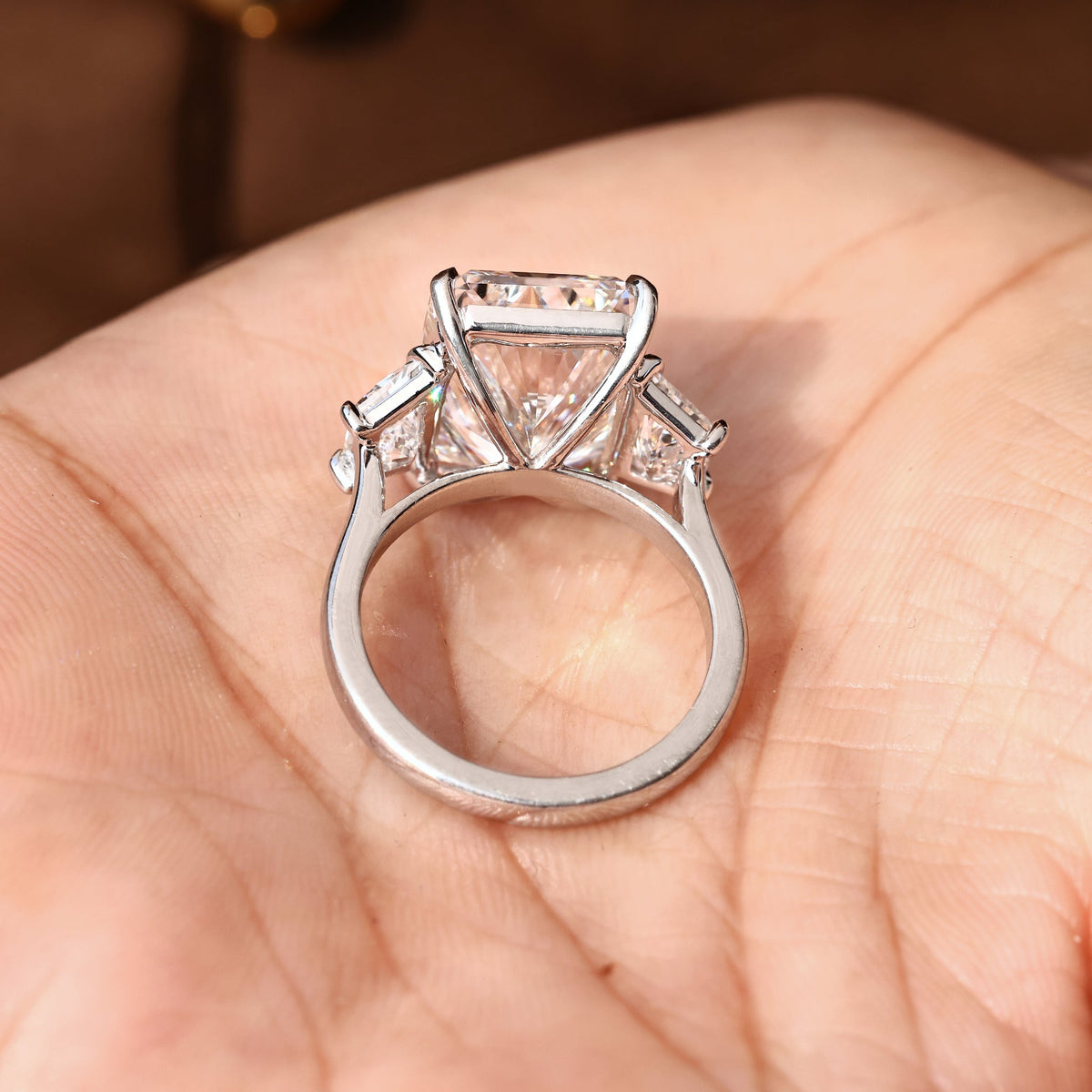 10 - 14 Carat Radiant Cut Diamond Ring with Trapezoid Side Stones