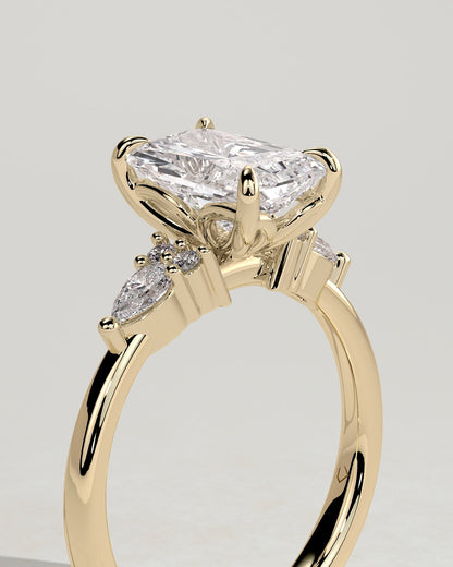 Heidi - Radiant Claw Solitaire with Pear Accents and Round Shoulder Stones Engagement Ring - Yellow Gold