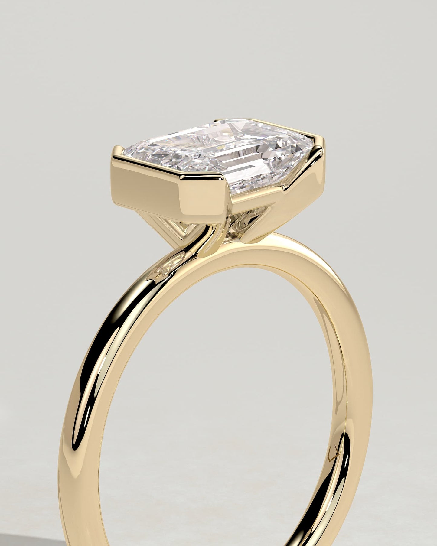 Jodie - Emerald East West Half Bezel Solitaire Engagement Ring - Yellow Gold