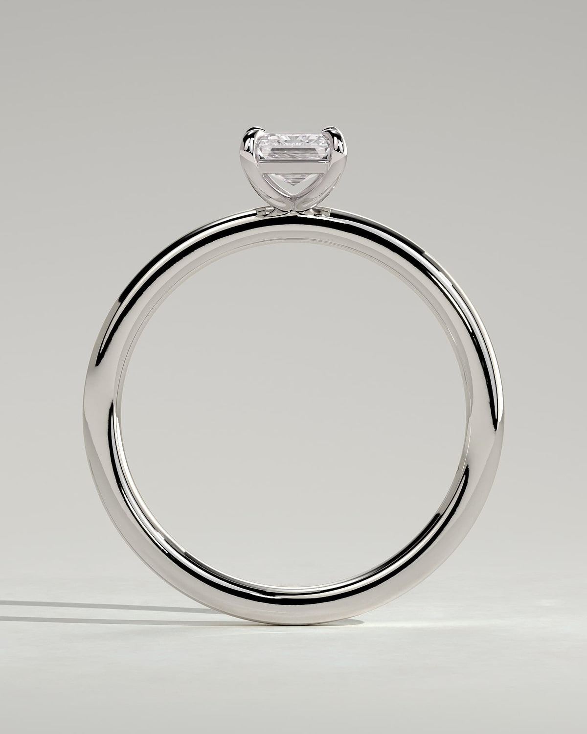 Alina - Emerald Claw Solitaire Engagement Ring - Platinum