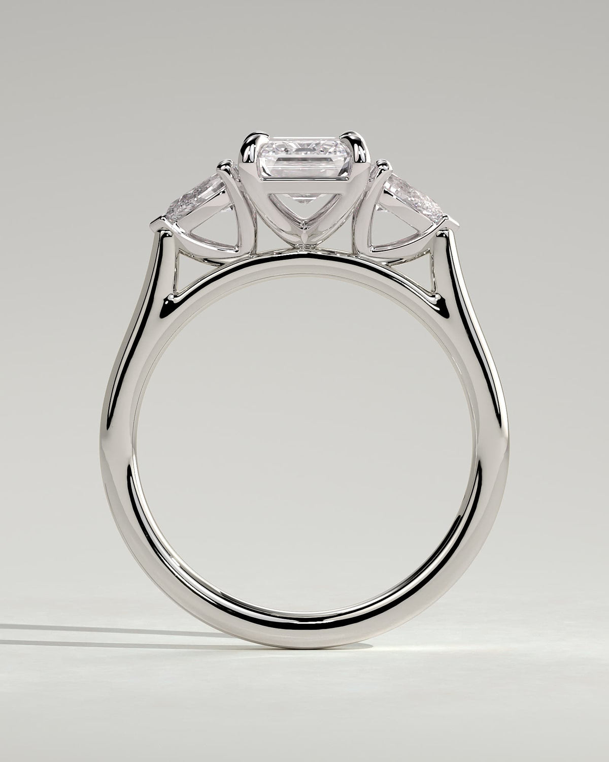 Davina - Emerald Claw Trilogy with Pear Side Stones and Cathedral Setting Engagement Ring - White Gold